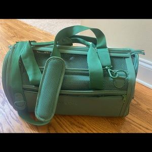 Wild One green dog travel carrier